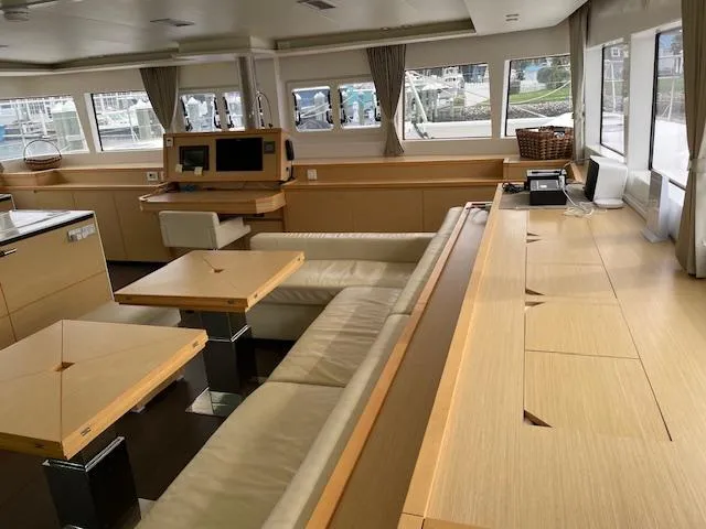 Slide: The Image of Interior of a 2014 Lagoon 620 yacht with modern furnishings. - 29