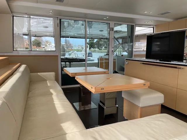 Slide: The Image of Interior of a 2014 Lagoon 620 yacht with modern design. - 31