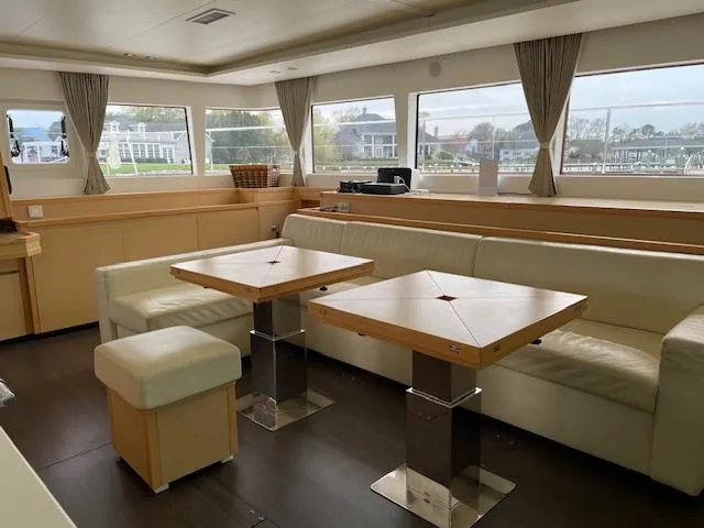 Slide: The Image of Interior of a 2014 Lagoon 620 yacht with elegant furnishings. - 34