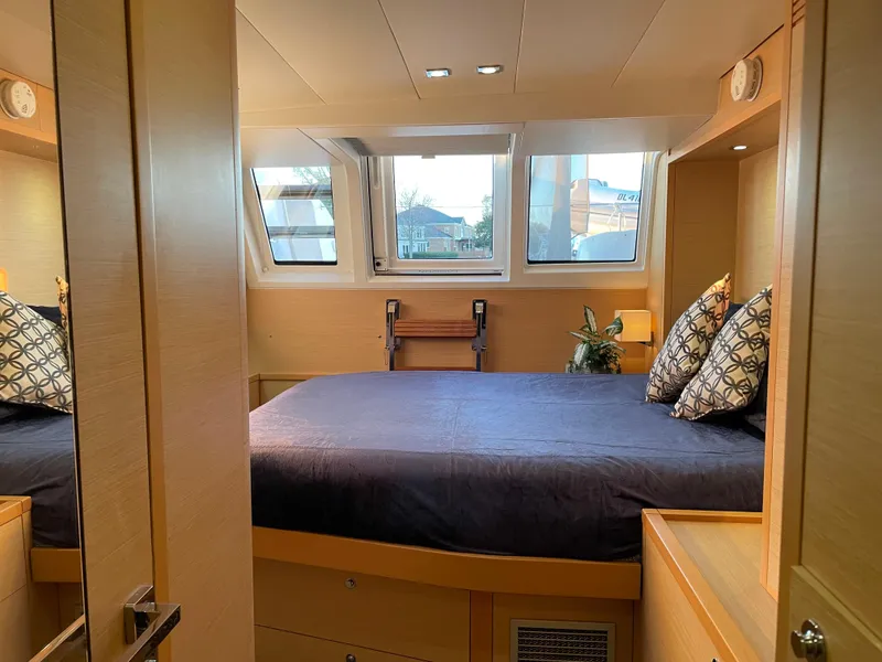 Slide: The Image of Luxurious bedroom in 2014 Lagoon 620 yacht with modern decor. - 35