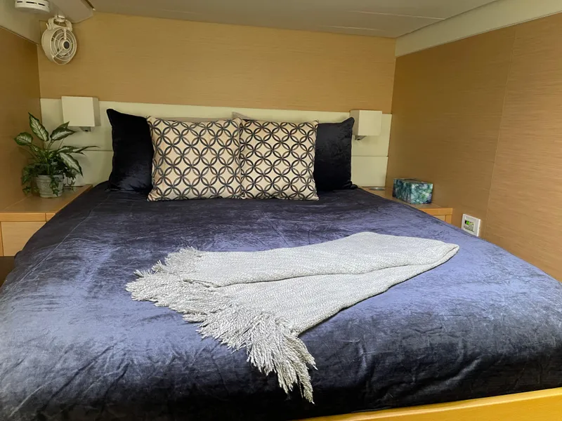 Slide: The Image of Luxurious bedroom on Lagoon 620 yacht, year 2014. - 38