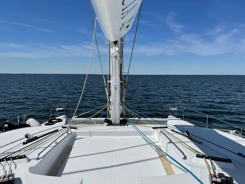 Slide: The Image of Lagoon 620 catamaran on open sea, year 2014. - 4