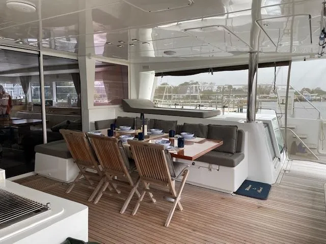 Slide: The Image of Luxurious dining area on a 2014 Lagoon 620 yacht. - 48