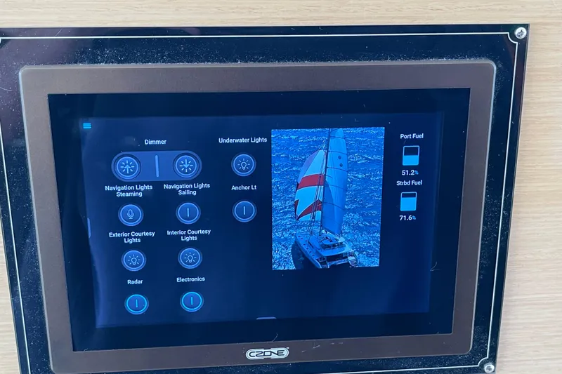 Slide: The Image of Touchscreen control panel on a 2014 Lagoon 620 yacht, displaying navigation and fuel information. - 54