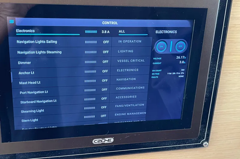 Slide: The Image of Control panel display on a 2014 Lagoon 620 yacht, showing electronic settings and status. - 55