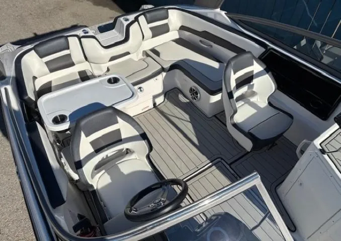 Slide: The Image of 2020 Yamaha Boats 195S interior with sleek seating and modern design. - 11