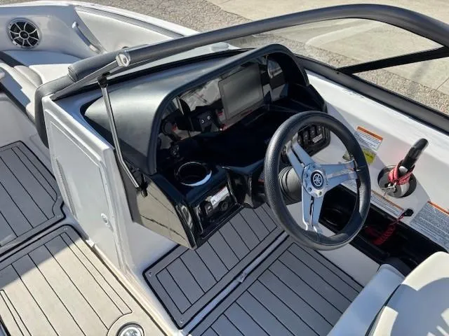 Slide: The Image of 2020 Yamaha Boats 195S cockpit with steering wheel and dashboard controls. - 17