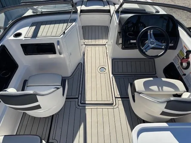 Slide: The Image of 2020 Yamaha Boats 195S interior with sleek seating and modern dashboard design. - 20