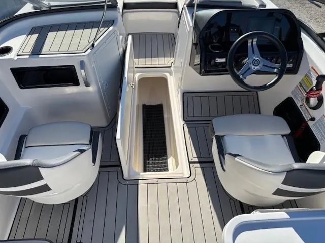 Slide: The Image of 2020 Yamaha Boats 195S interior with sleek seating and modern dashboard design. - 21