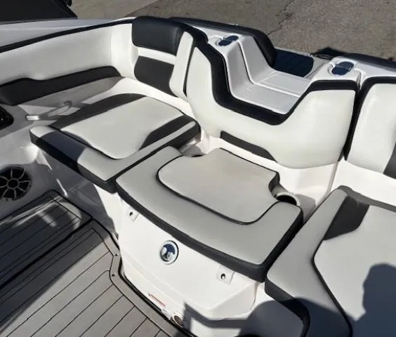 Slide: The Image of 2020 Yamaha Boats 195S interior seating with black and white upholstery. - 27