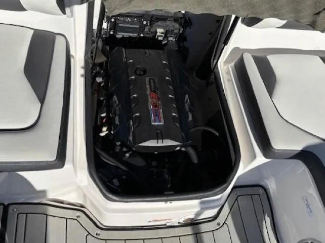Slide: The Image of 2020 Yamaha Boats 195S engine compartment with open hatch, showcasing interior details. - 29