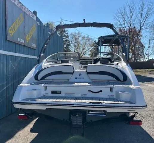 Slide: The Image of 2020 Yamaha Boats 195S, white, parked outdoors, rear view. - 4