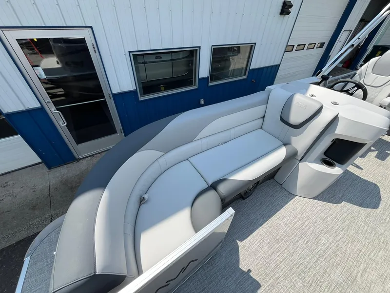 Slide: The Image of 2025 Avalon LSZ Versatile Rear Bench boat with sleek gray seating and modern design. - 12