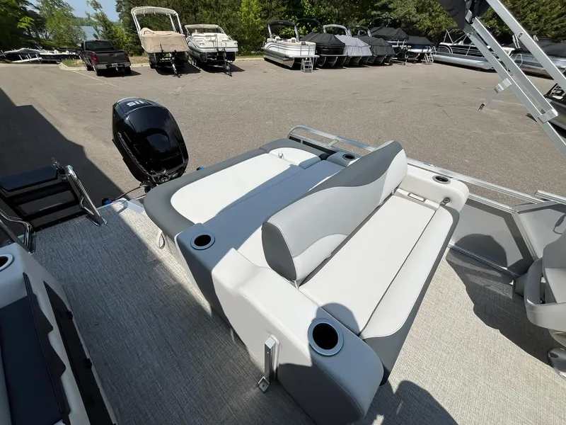 Slide: The Image of 2025 Avalon LSZ Versatile Rear Bench boat with sleek seating and modern design. - 17