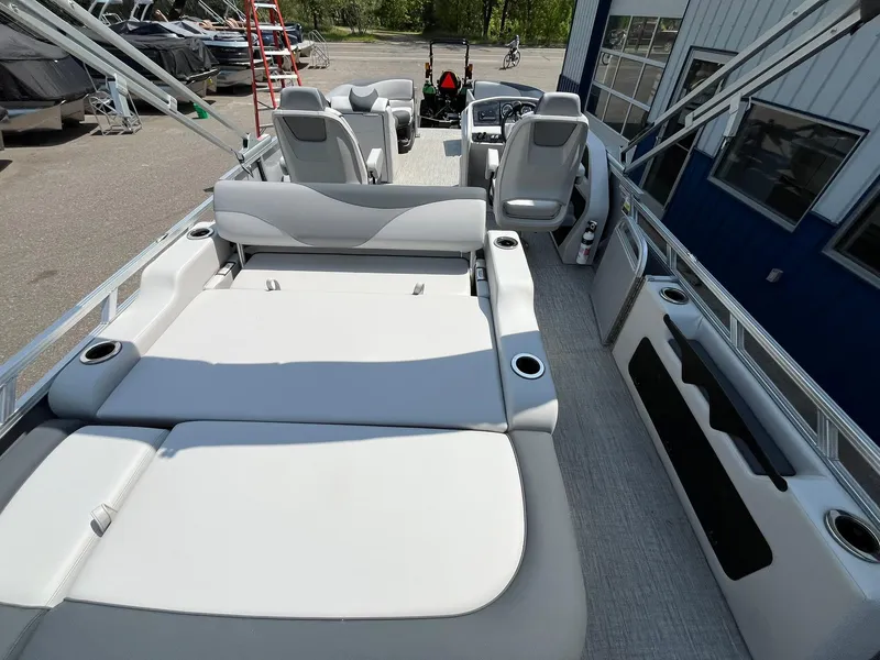 Slide: The Image of 2025 Avalon LSZ Versatile Rear Bench boat interior with spacious seating and modern design. - 20