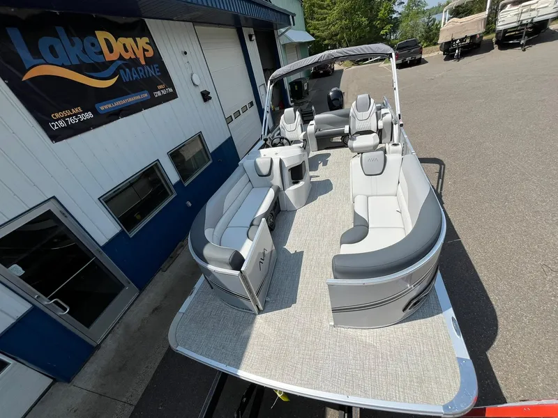 Slide: The Image of 2025 Avalon LSZ Versatile Rear Bench pontoon boat at Lake Days Marine dealership. - 8