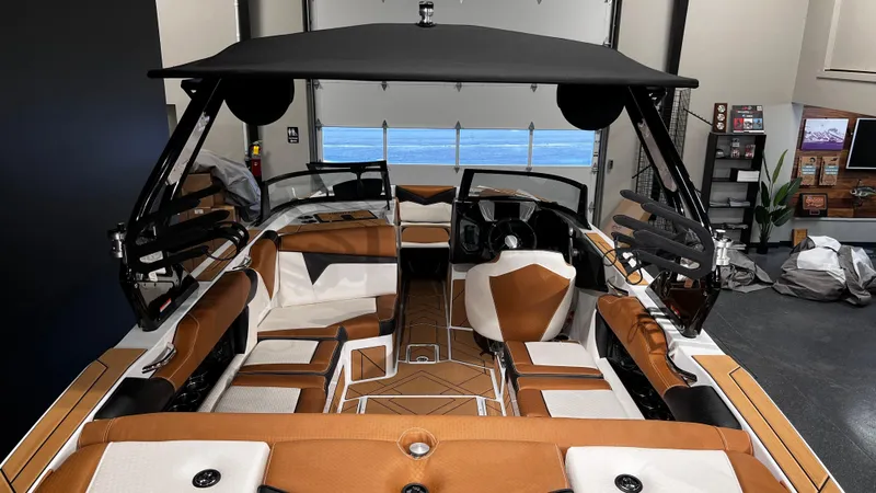 Slide: The Image of 2024 Supreme S220 boat interior with luxurious seating and modern design. - 12