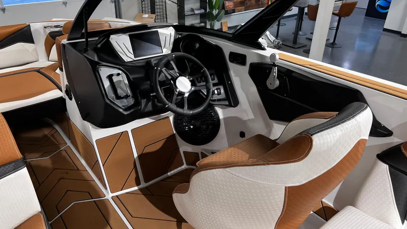 Slide: The Image of 2024 Supreme S220 boat interior with modern dashboard and luxurious seating. - 25