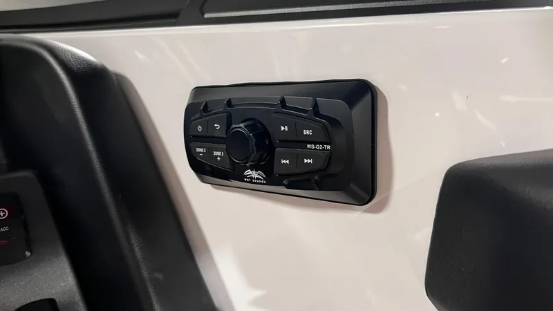 Slide: The Image of 2024 Supreme S220 audio control panel on a white interior surface. - 28