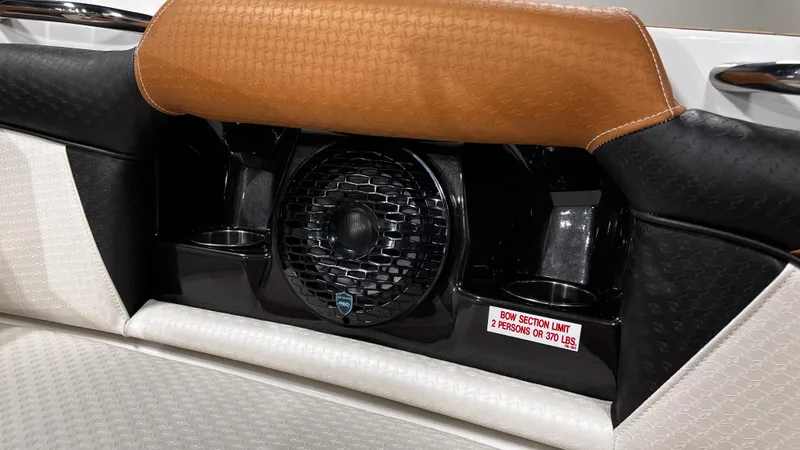 Slide: The Image of 2024 Supreme S220 boat interior with speaker and seating details. - 35