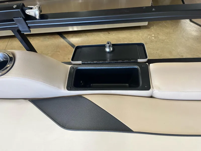 Slide: The Image of 2024 G3 322SS boat seat with open storage compartment. - 17