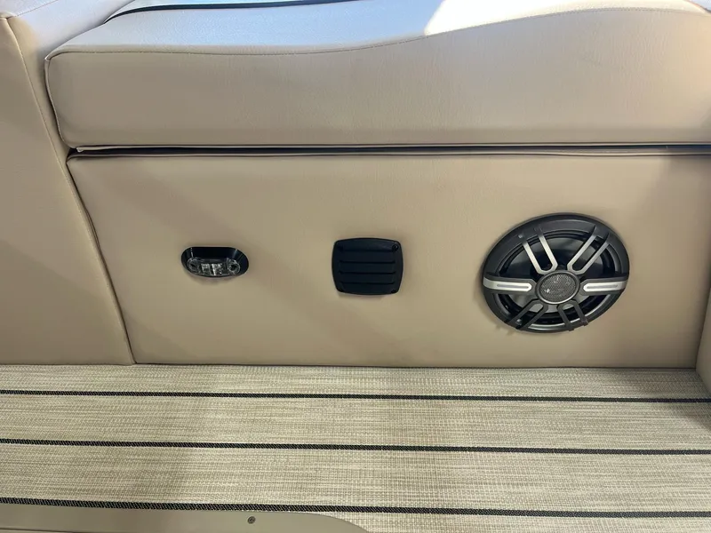 Slide: The Image of 2024 G3 322SS boat interior with speaker and beige upholstery. - 20