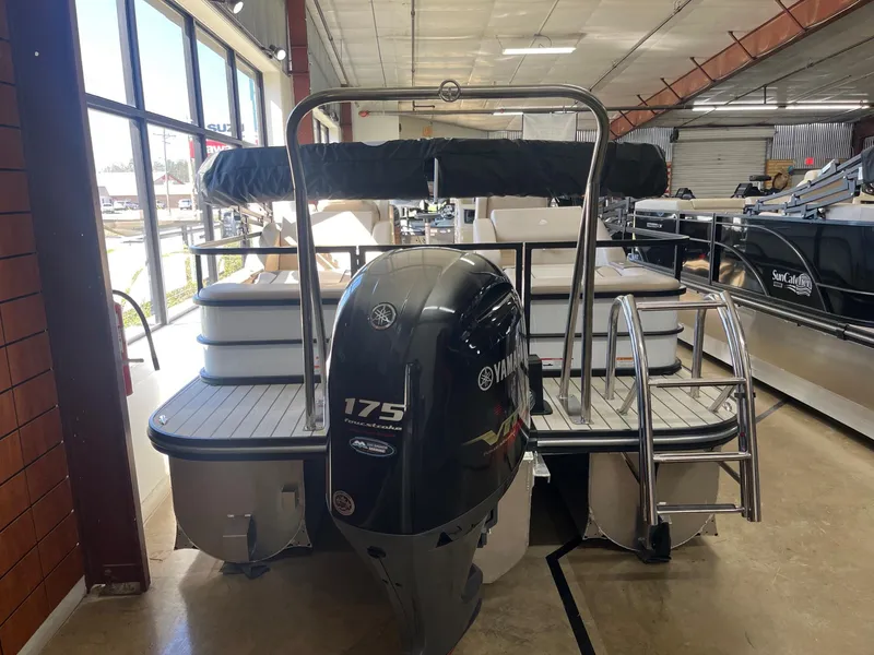 Slide: The Image of 2024 G3 322SS boat with Yamaha 175 engine in showroom. - 3