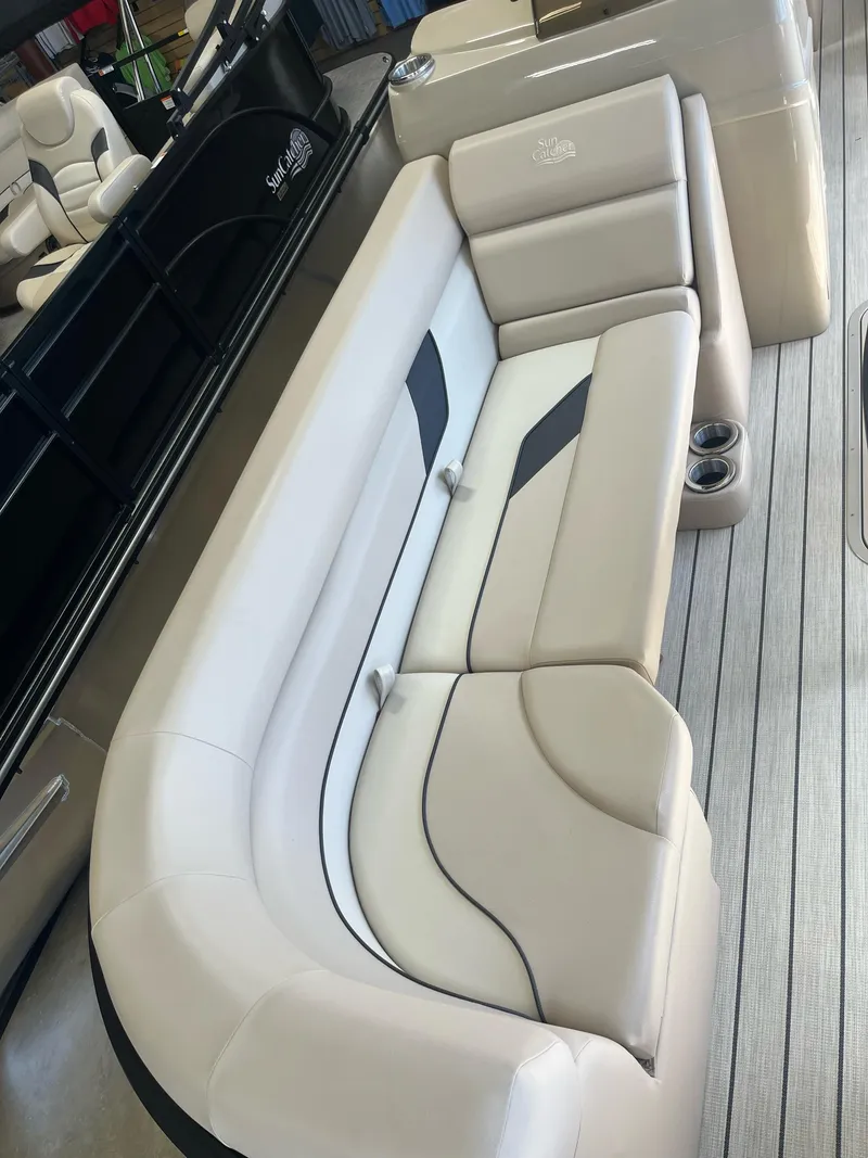 Slide: The Image of 2024 G3 322SS boat interior with plush seating and cup holders. - 5
