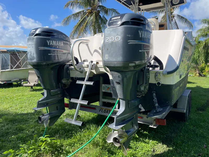 Slide: The Image of 1999 Grady-White X-26 Tiger Cat with twin Yamaha 200 engines on trailer. - 11