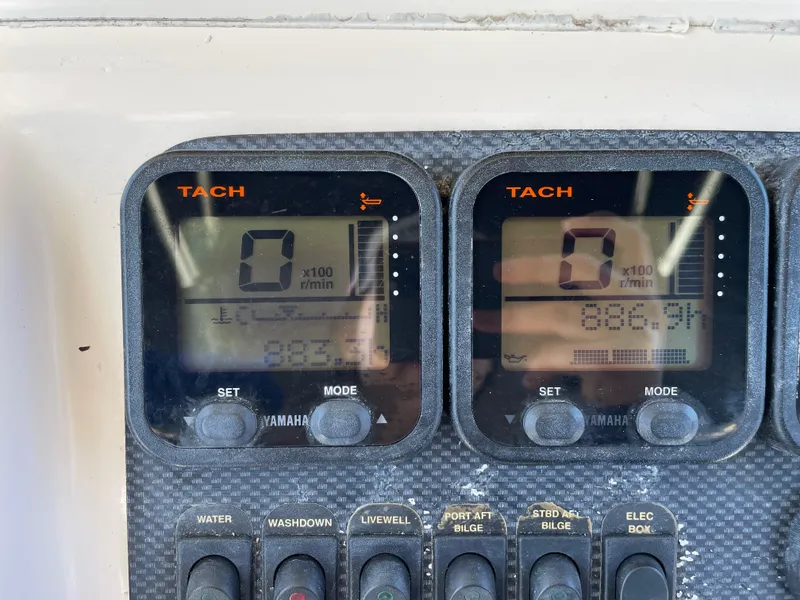 Slide: The Image of Close-up of 1999 Grady-White X-26 Tiger Cat dashboard with Yamaha tachometers. - 24