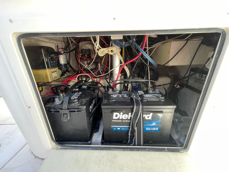 Slide: The Image of Battery compartment of 1999 Grady-White X-26 Tiger Cat with DieHard Silver batteries. - 45