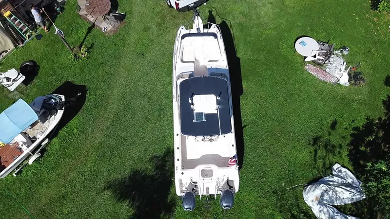 Slide: The Image of Aerial view of 1999 Grady-White X-26 Tiger Cat boat on grass. - 9