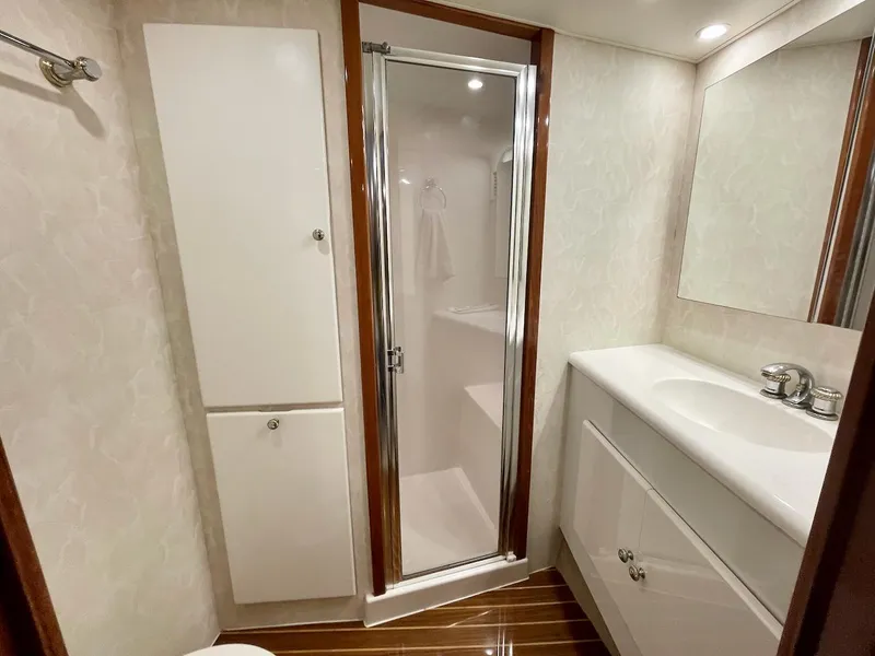 Slide: The Image of Luxurious bathroom in 2001 Post 50 Convertible yacht with shower and vanity. - 26