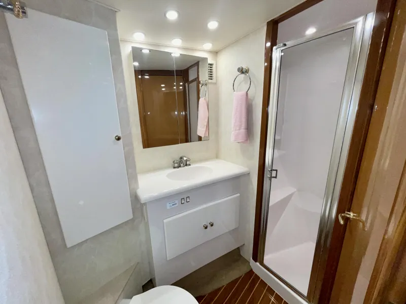Slide: The Image of Luxurious bathroom in 2001 Post 50 Convertible yacht with shower and vanity. - 32