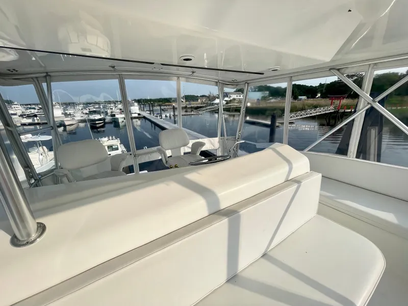 Slide: The Image of Luxurious 2001 Post 50 Convertible yacht interior with marina view. - 48