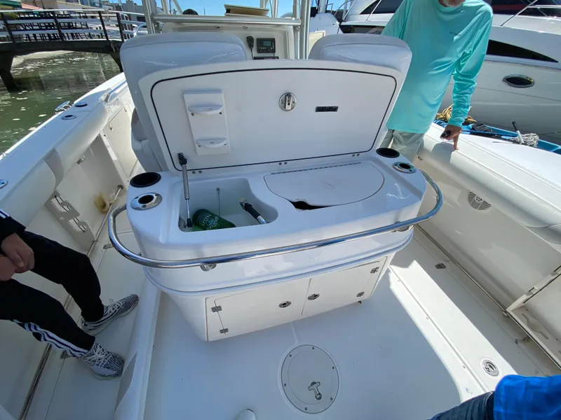 Slide: The Image of 2007 Boston Whaler 320 Outrage boat interior with open storage compartment. - 39