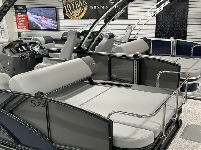 Slide: The Image of 2025 Bennington 23 SSB pontoon boat interior with sleek seating and modern design. - 19