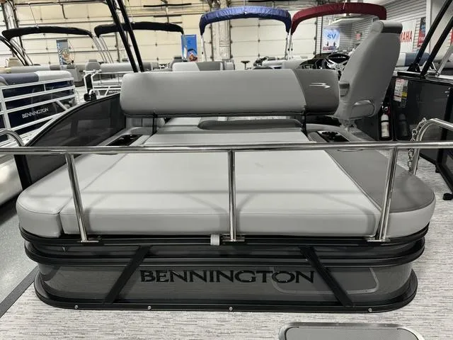 Slide: The Image of 2025 Bennington 23 SSB pontoon boat with gray seating and sleek design. - 26