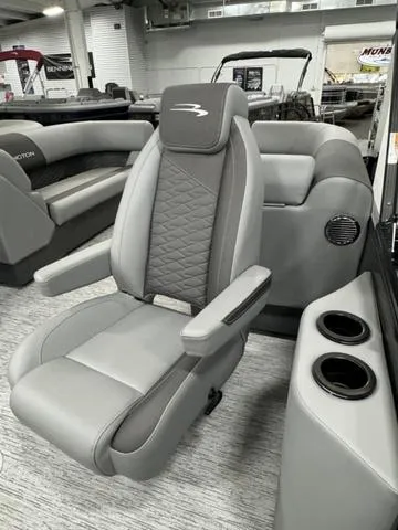 Slide: The Image of 2025 Bennington 22 SSR boat interior with luxurious gray seating and cup holders. - 15