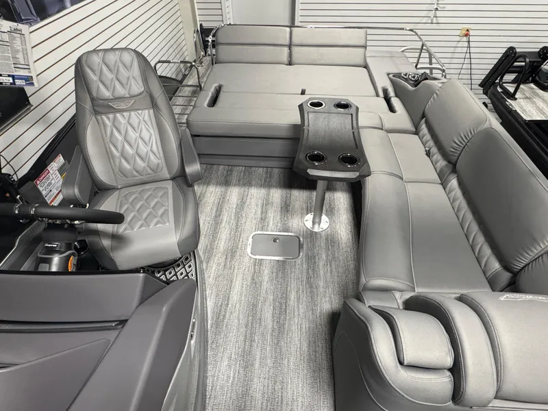 Slide: The Image of Luxurious interior of 2025 Bennington 25 RSB pontoon boat with plush seating and modern design. - 14