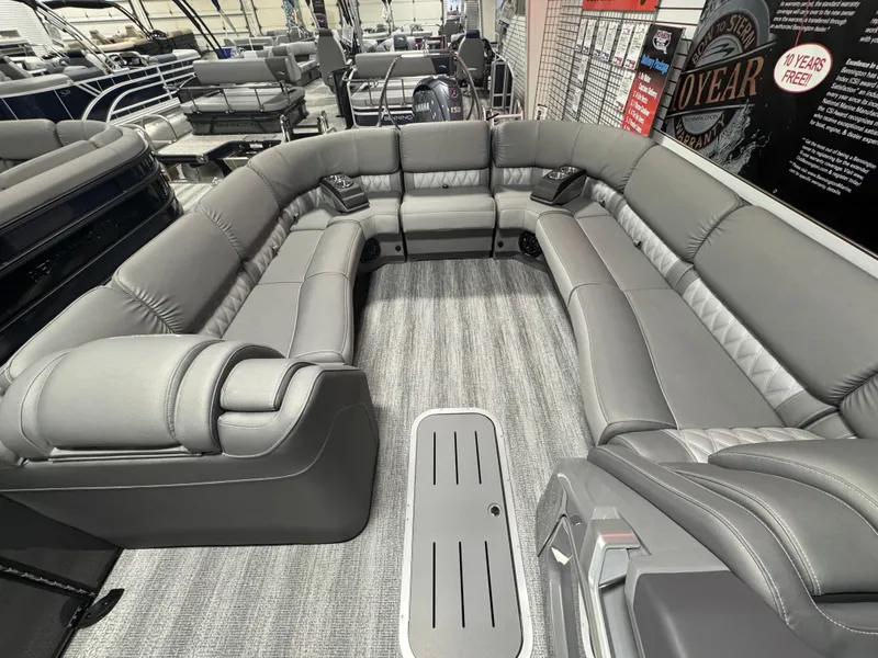 Slide: The Image of Luxurious seating on 2025 Bennington 25 RSB pontoon boat, featuring sleek gray upholstery. - 9