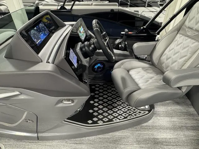 Slide: The Image of Dashboard of 2025 Bennington 25 RFBSE boat with advanced digital displays. - 16