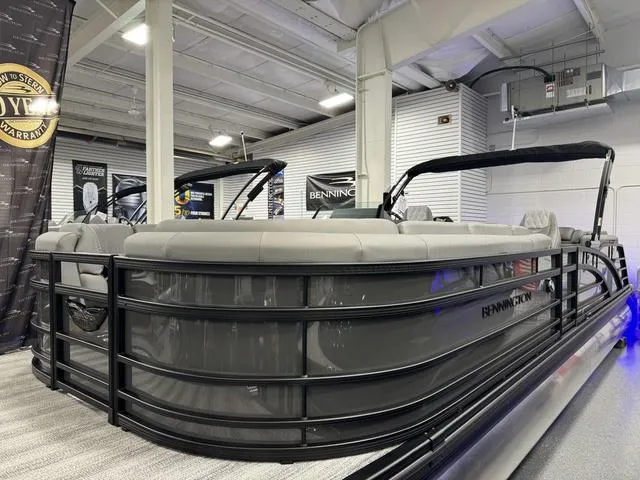 Slide: The Image of 2025 Bennington 25 RFBSE pontoon boat displayed in a showroom setting. - 3
