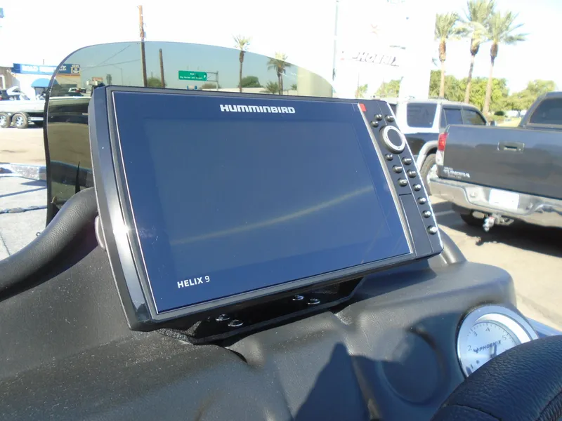 Slide: The Image of Humminbird Helix 9 fishfinder on 2025 Phoenix 819 ZXL boat dashboard. - 12