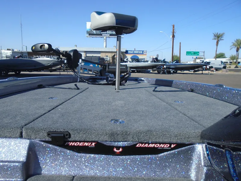 Slide: The Image of 2025 Phoenix 819 ZXL boat deck with fishing seat and equipment. - 13