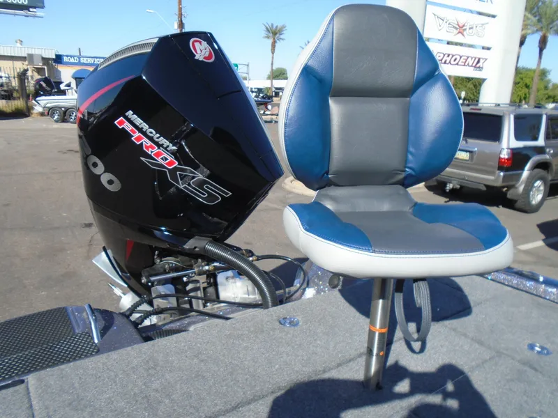 Slide: The Image of Phoenix 819 ZXL 2025 boat with Mercury Pro XS engine and blue seat. - 15
