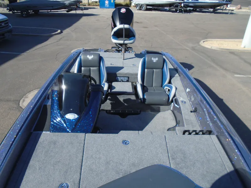 Slide: The Image of 2025 Phoenix 819 ZXL boat interior with dual seats and sleek design. - 3