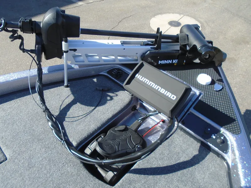 Slide: The Image of Phoenix 819 ZXL 2025 boat with Humminbird and Minn Kota equipment on deck. - 4