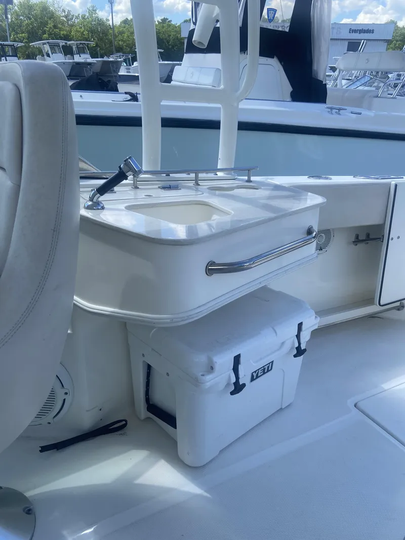Slide: The Image of 2018 Boston Whaler 230 Vantage with sink and Yeti cooler. - 15