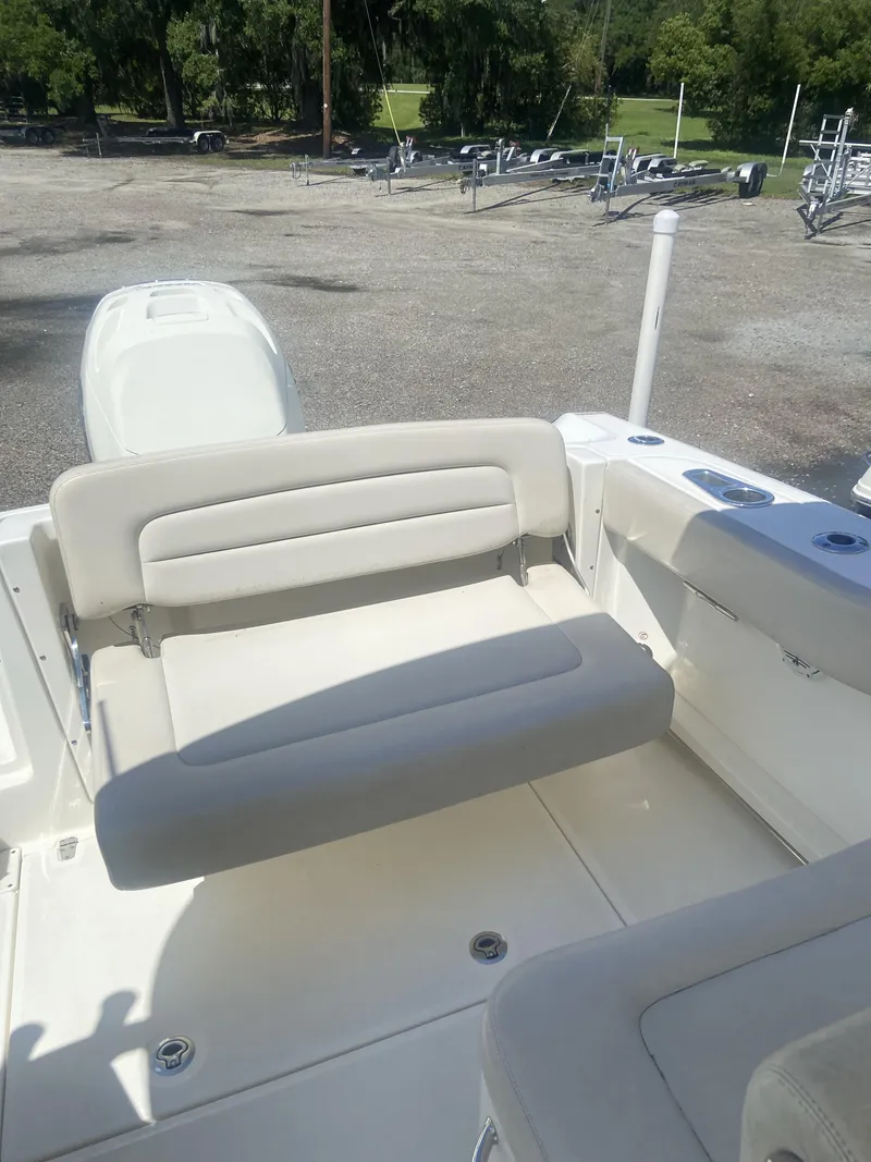 Slide: The Image of Interior of a 2018 Boston Whaler 230 Vantage boat with seating bench. - 5